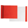 A roll of red suede wrap fabric next to a sheet of white fabric for DIY projects.