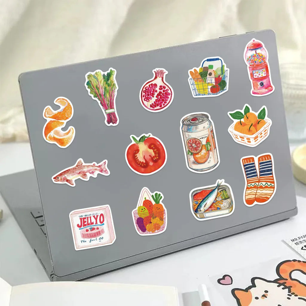 A laptop displaying a collection of colorful Mediterranean aesthetic graffiti stickers on its surface.