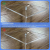 Installation guide showing how to secure a clear acrylic balloon stand kit onto a countertop using screws.