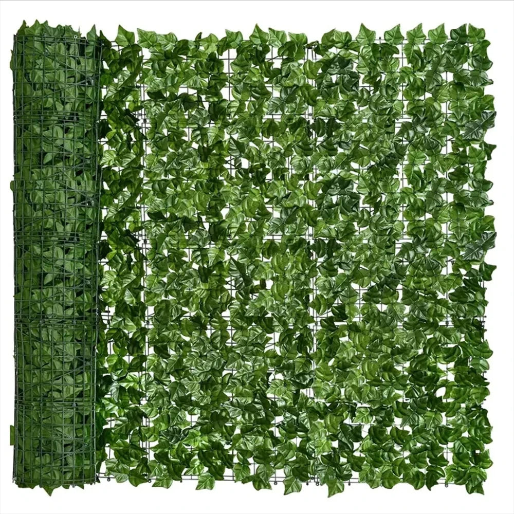 Green artificial ivy hedge fence panels covering a surface.