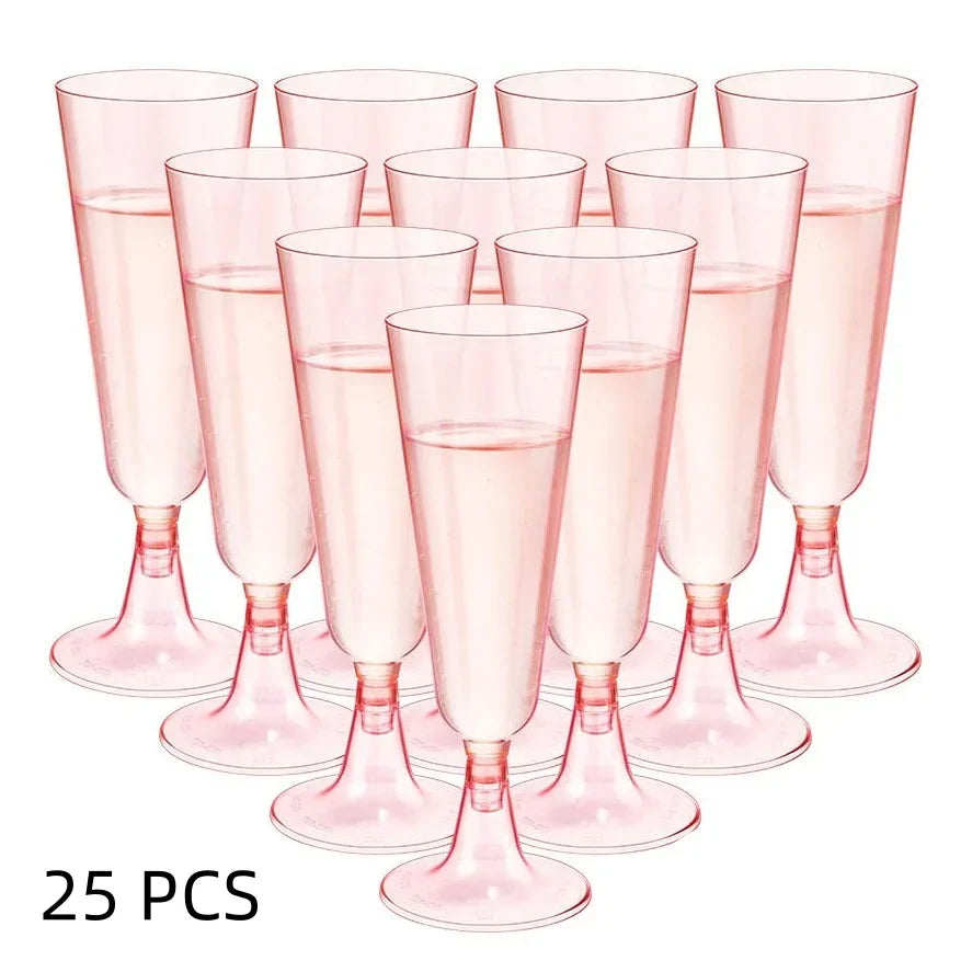 A set of 25 clear pink disposable champagne glasses with a gold finish displayed on a white background.
