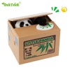 A cardboard box containing an interactive coin bank shaped like a panda, featuring bamboo elements for kids.