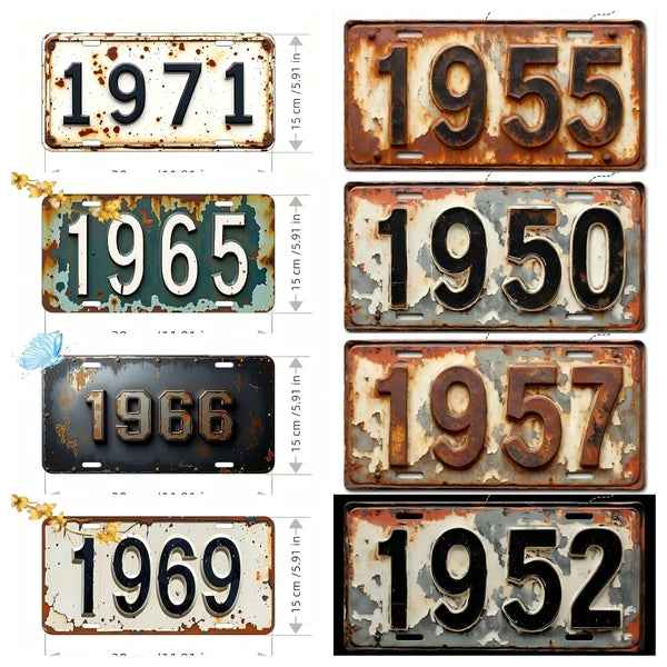 A collection of vintage style aluminum license plates showing various years like 1971, 1955, 1965, and 1950.