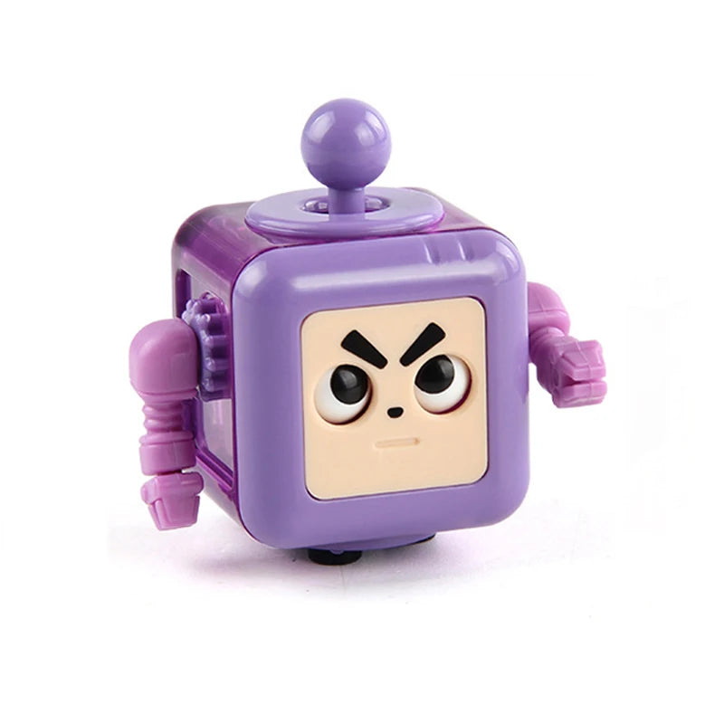 A purple fidget cube with a yellow face design and a purple top, used as a stress relief toy.