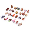 A collection of various brown and white animal figurines, including bears, cats, and dogs, for desk decor.
