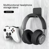 A black multifunctional headphone storage stand featuring over-ear headphones and a clamp for mounting.