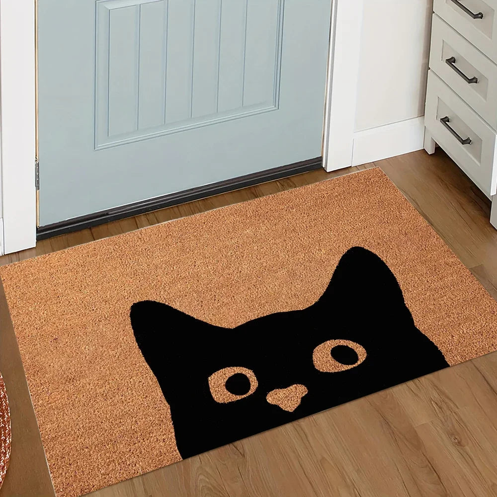 A black silhouette of a cat with a knife is printed on a brown, non-slip doormat.