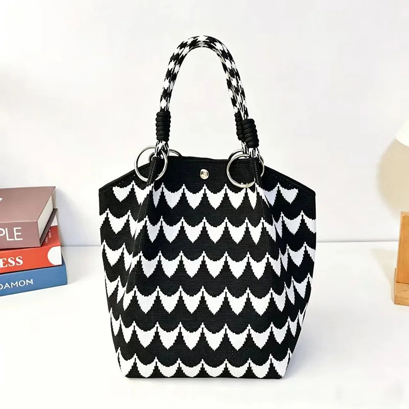 Black and white patterned jacquard knitted shoulder bag with black leather handles