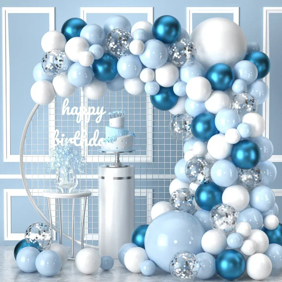 A blue and white balloon garland arch decorated with silver glitter balloons for a party or wedding backdrop.
