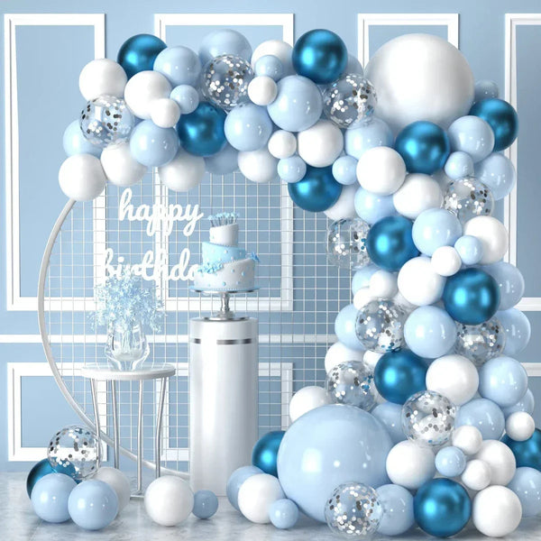 A blue and white balloon garland arch decorated with silver glitter balloons for a party or wedding backdrop.