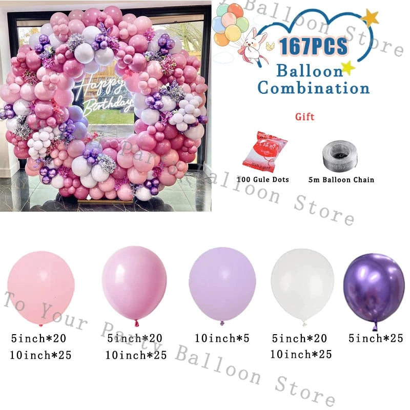 A pink balloon garland arch decoration featuring various shades of pink and purple balloons for a birthday celebration.