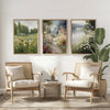 A set of three framed canvas paintings depicting spring flowers and landscapes displayed on a white wall.