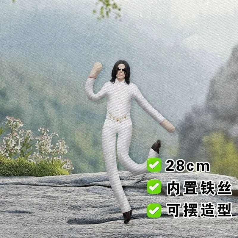 A white action figure of Michael Jackson with a poseable wire skeleton, shown standing on a rocky landscape.