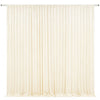 Cream pleated drapery backdrop used as an elegant wrinkle-free fabric for weddings and parties