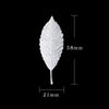 A single, detailed tea brewing leaf in sterling silver, shown against a black background with dimension lines.