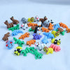 A collection of colorful 3D printed cartoon animal figurines featuring various animals like deer, cats, and bears.