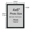 A black wooden picture frame with a gray mat, measuring 4x6 inches or 10x15 cm.