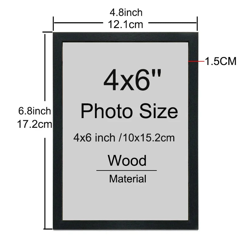 A black wooden picture frame with a gray mat, measuring 4x6 inches or 10x15 cm.