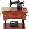 A vintage clockwork music box featuring a black sewing machine on a wooden table.