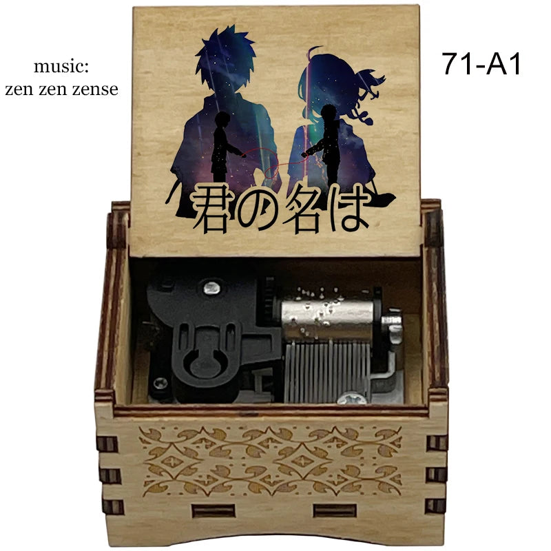 Adorno de caja de música de madera con ilustración pintada de dos figuras y texto japonés en la tapa.