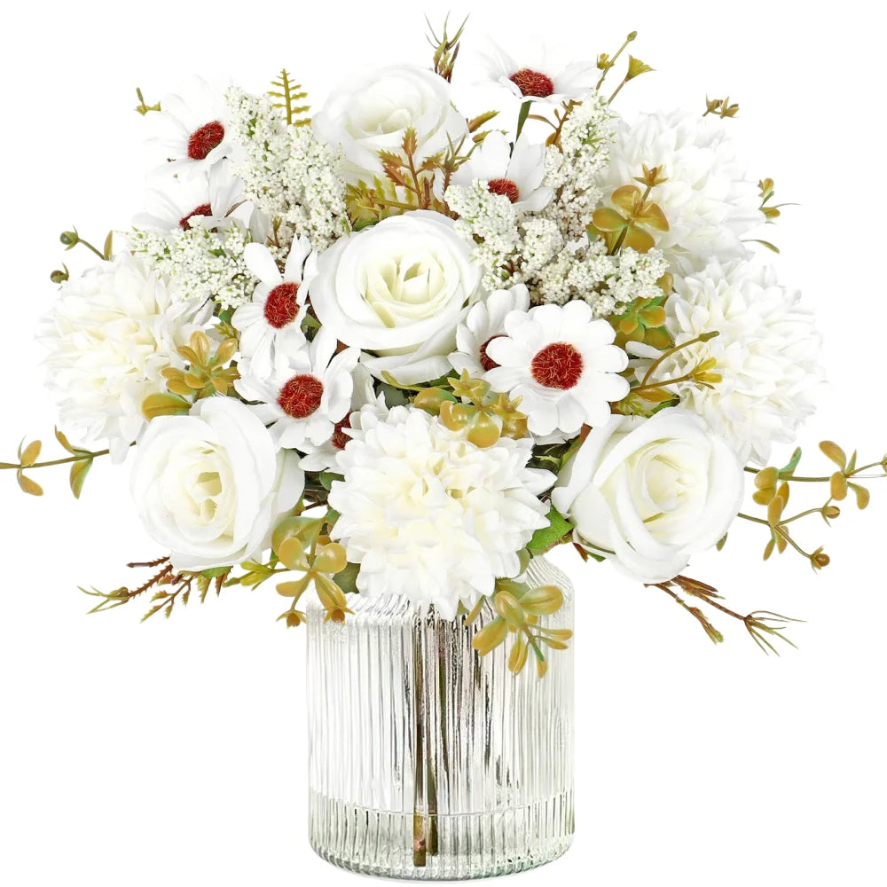 A bouquet of artificial silk white roses and daisies arranged in a clear glass vase.