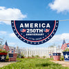 A dark blue bunting flag with the text AMERICA 250TH ANNIVERSARY and the years 1776-2026 strung between two poles under a blu