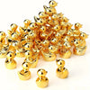 A pile of 20 miniature gold duck figurines for crafts and decor