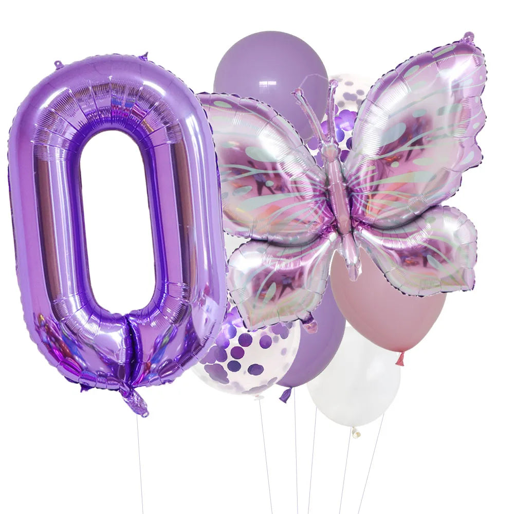 A set of purple foil balloons shaped like the number zero and a butterfly