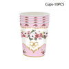 A set of 10 pink cups with vintage floral patterns for a party table.