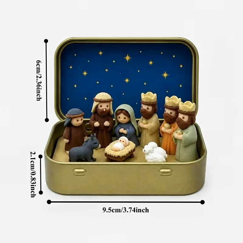 Miniature nativity scene set featuring Mary, Jesus, shepherd, and animal figurines displayed in a gold-colored box.