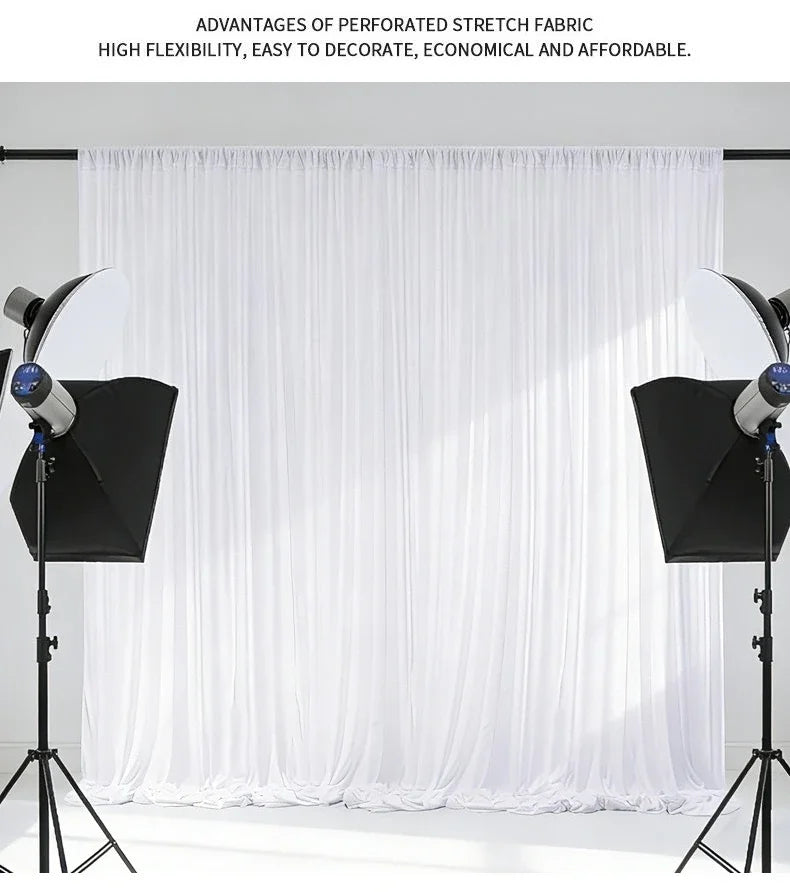 A white sheer fabric drape is shown hanging in a studio setting, used as an elegant backdrop.