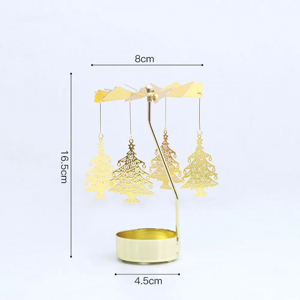 A gold rotating candle holder with three branches holding tealight candles, shown against a white background.
