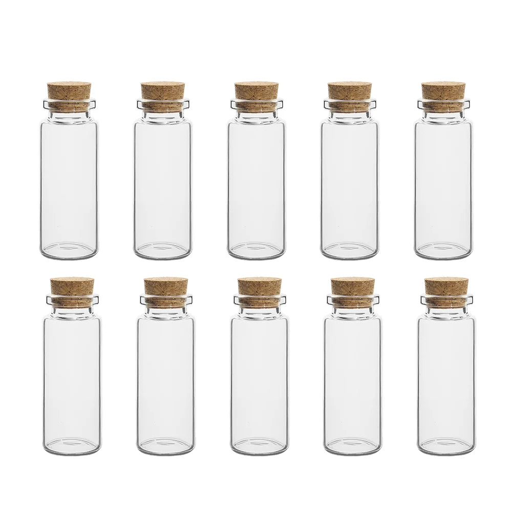 A set of clear glass vials with natural cork stoppers arranged in a grid.