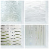 Close-up view of various frosted glass window privacy films showing different textures and patterns.