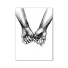 Black and white line art of two hands clasped together