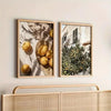 Framed canvas wall art featuring olive fruit and foliage against a light background.