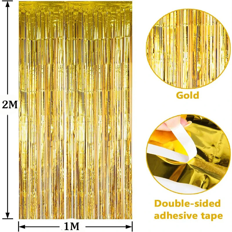 Vertical display of gold metallic tinsel foil fringe curtain backdrop with double-sided adhesive tape.