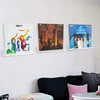 Three acrylic vinyl record display shelves featuring ABBA and The Visitors album covers on a white wall.