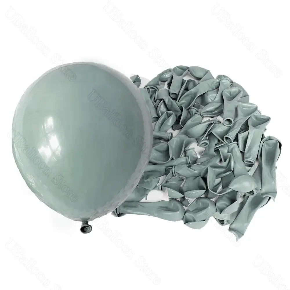 A bunch of light sage green latex balloons is shown next to a single pale gray balloon.