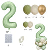 A set of vintage green and gold foil balloons shaped like the number 2 and various round numbers for birthday decor