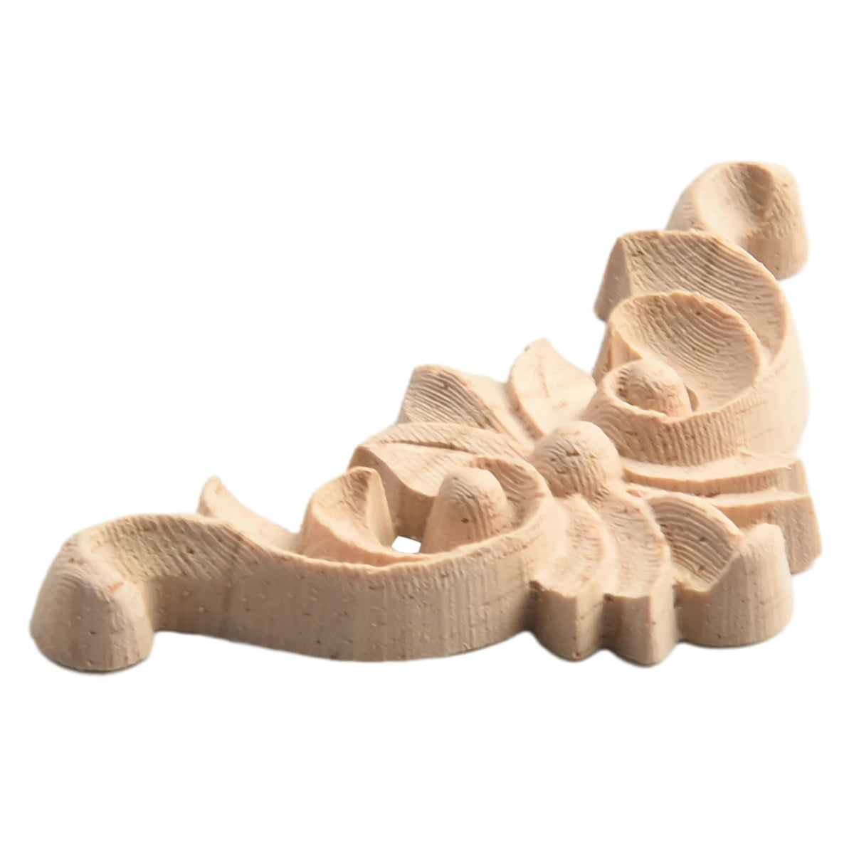 A set of four light wood carved corner appliques used for furniture and frame decoration.