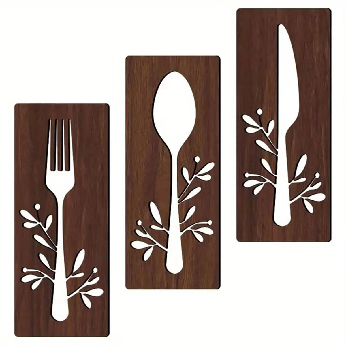 A set of three wooden utensils, including a fork, spoon, and knife, carved into decorative shapes for wall display.