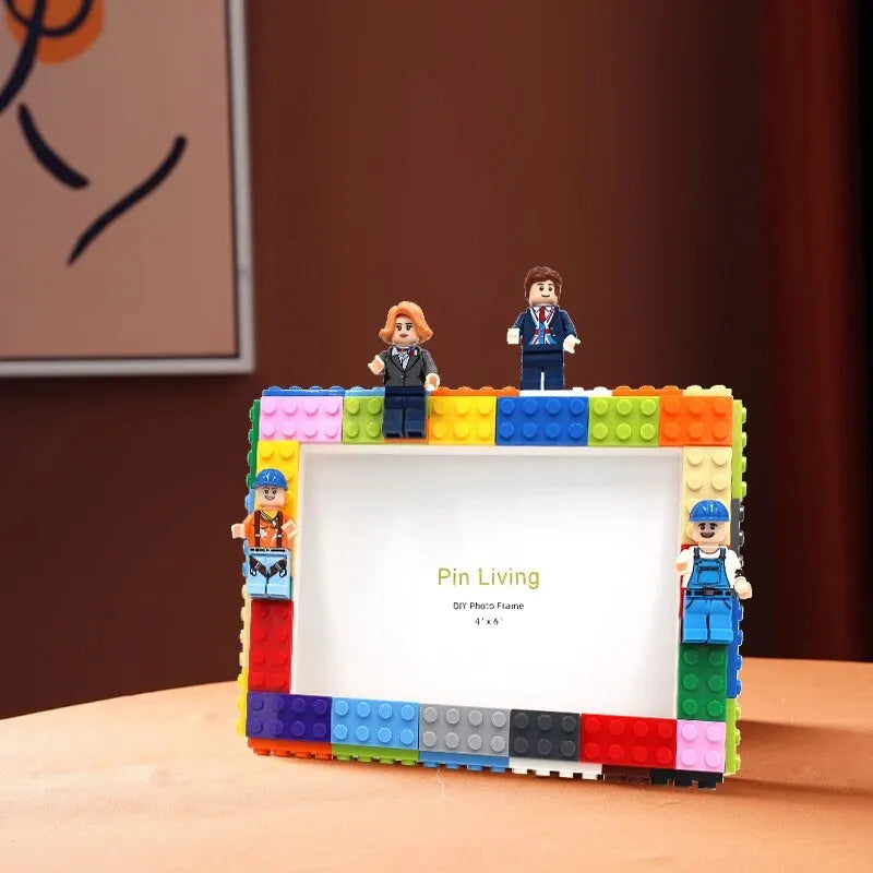 A DIY building block photo frame kit featuring minifigures and a white display area.