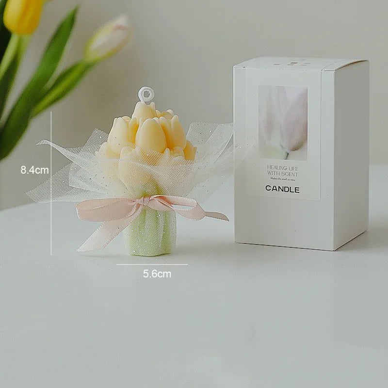 A white box candle labeled Healing Life with Scent, featuring a bouquet of yellow and pink tulip-shaped wax flowers.