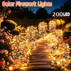 A pathway illuminated by solar fireworks lights with 200 LED starburst effects in a garden setting.