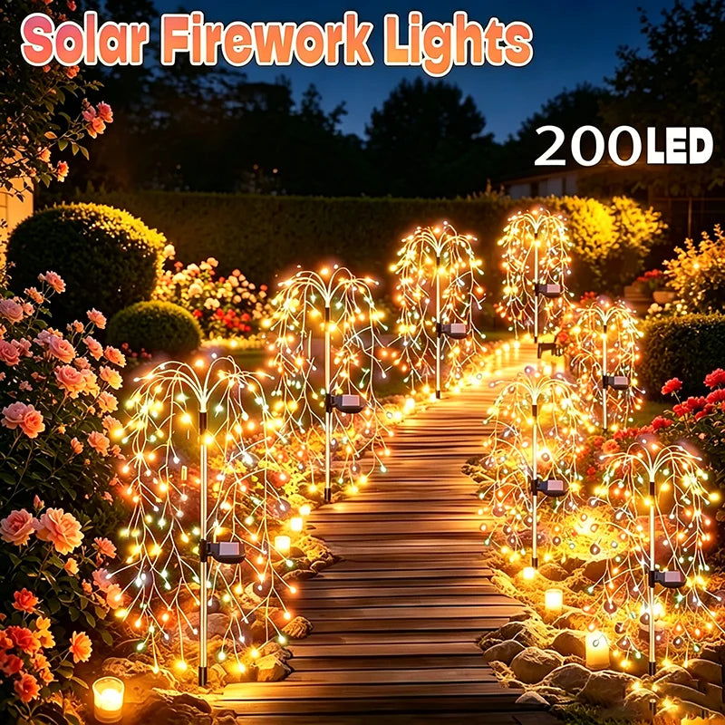 A pathway illuminated by solar fireworks lights with 200 LED starburst effects in a garden setting.