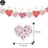 A string of red heart-shaped balloons with Valentine's Day messages and foil finish.