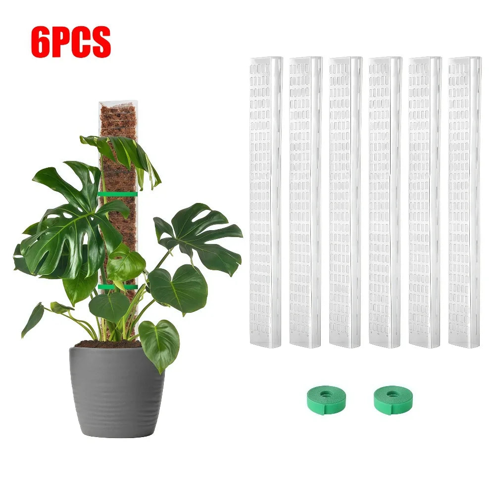 Six pieces of white plastic moss pole plant support for climbing plants with green plant cuttings.