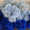 A bouquet of silk roses in various shades of blue, including light blue and deep blue.