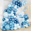 A large balloon garland arch made of light blue and navy blue balloons for a party decoration.